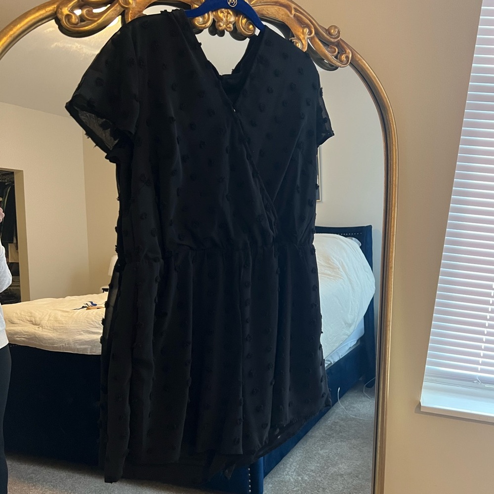 Black fully lined romper. Fits like 1X